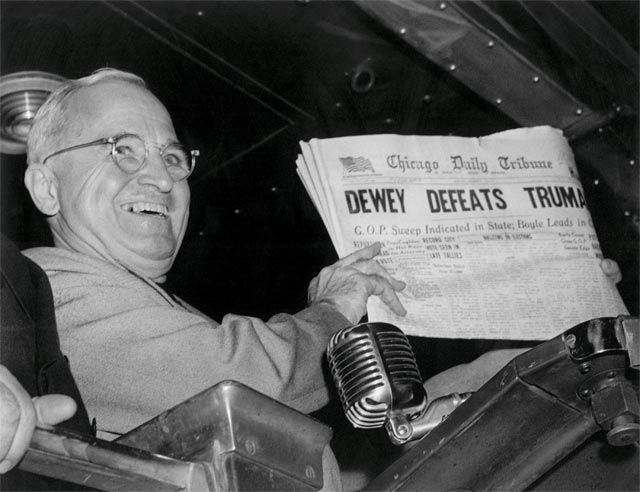 ST. LOUIS/November 1948--President Harry S. Truman shows well-wishers at Union Station a copy of the Chicago Daily Tribune, which mistakenly declared âDEWEY DEFEATS TRUMAN,â based on early returns. âThat is one for the books!â he said.